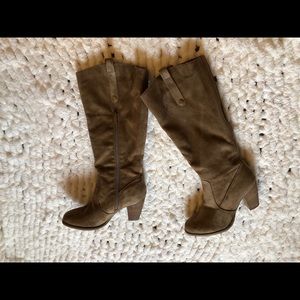 Beige riding boots with a heel